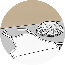 エプロンとキャップを着用