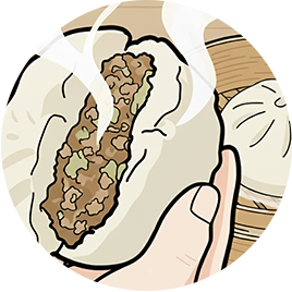 蒸し立ての豚まんを食べる